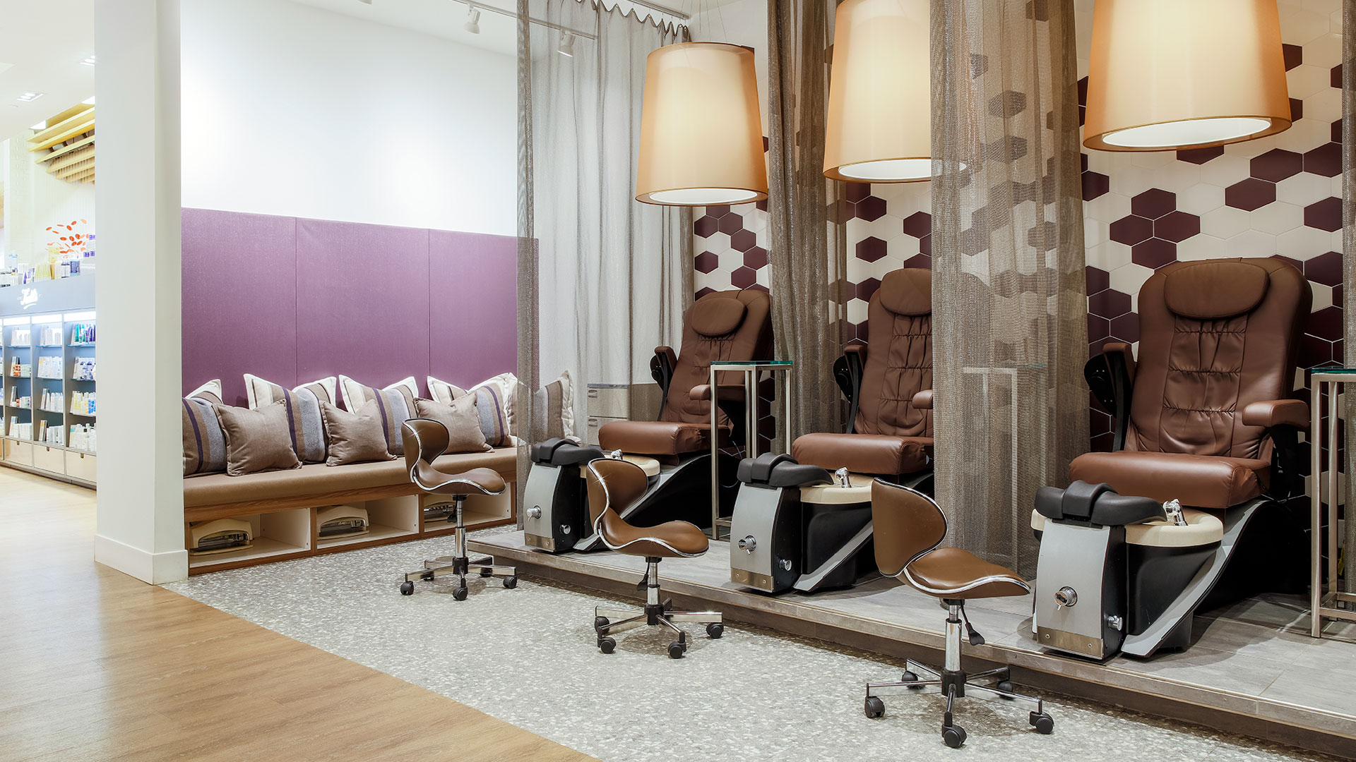 Wide shot of a bright, modern Scott Miller salon interior with minimalist decor.